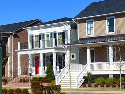 About-us Houses in a suburban New England neighborhood